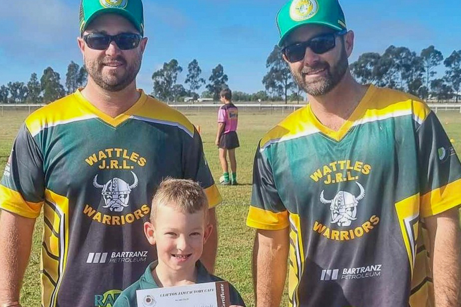 Wattles Under 8 ‘Clifton Jam Factory’ Player of the Match Ethan Willett with coaches Jared Gault and Tim Johnson. (Image – Rebecca Gault)