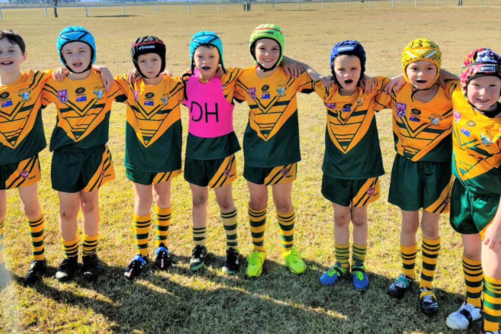 Wattles ‘Railway Hotel, Allora’ Under 8 line up that took on Warwick’s Collegians last Saturday at Platz Oval - (Left) Archie Moore, Chaz Daley, Jay Townsend, James Patterson, Jackson Wilson, Henry Ferguson, Kit Gilmore and Leo Williams. (Absent) Buddy Turner. (Image supplied)