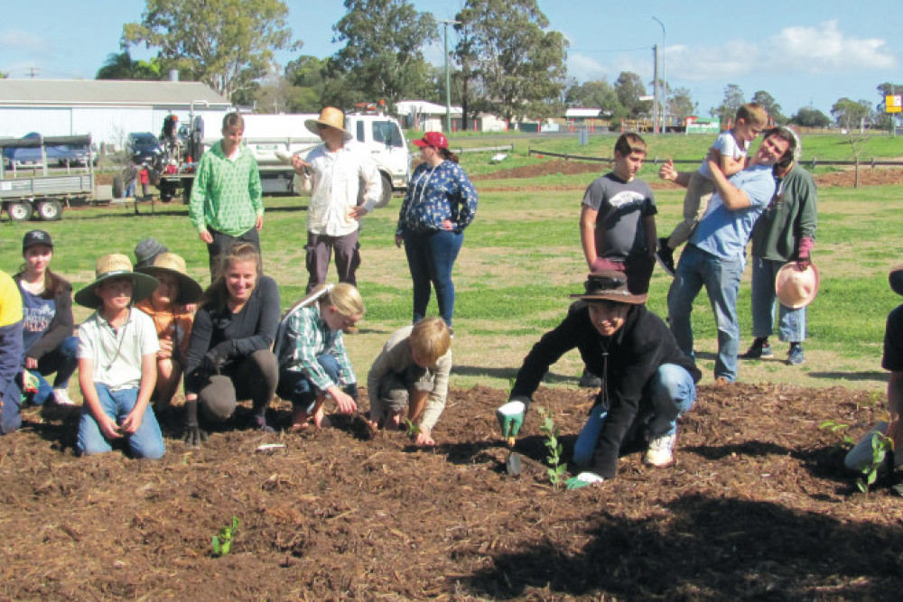 Some of the volunteers helping to plant trees.