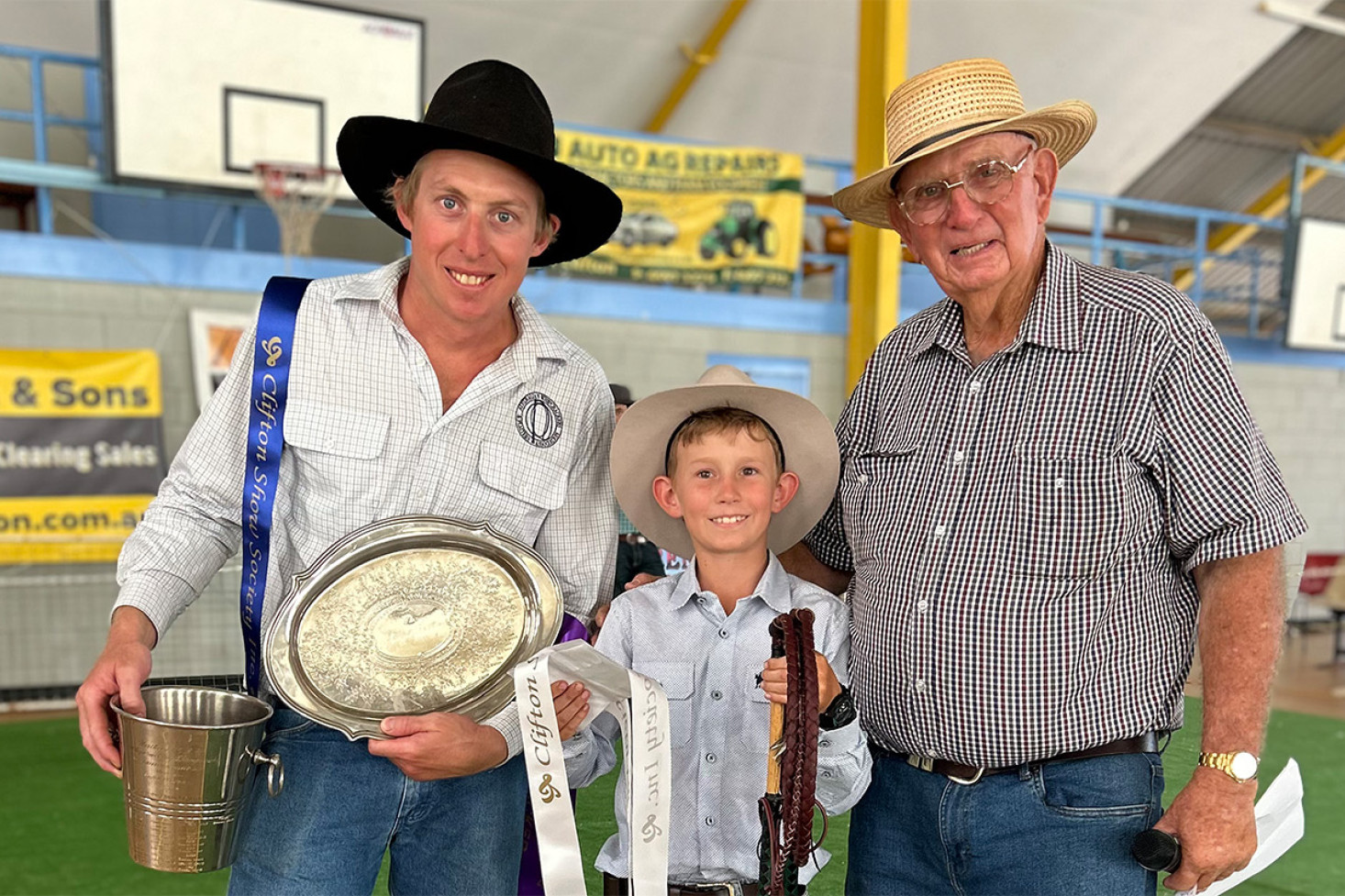 Australian whip cracking champion, Daniel Wicks, along with Henry and event organiser, Hilary O’Leary.