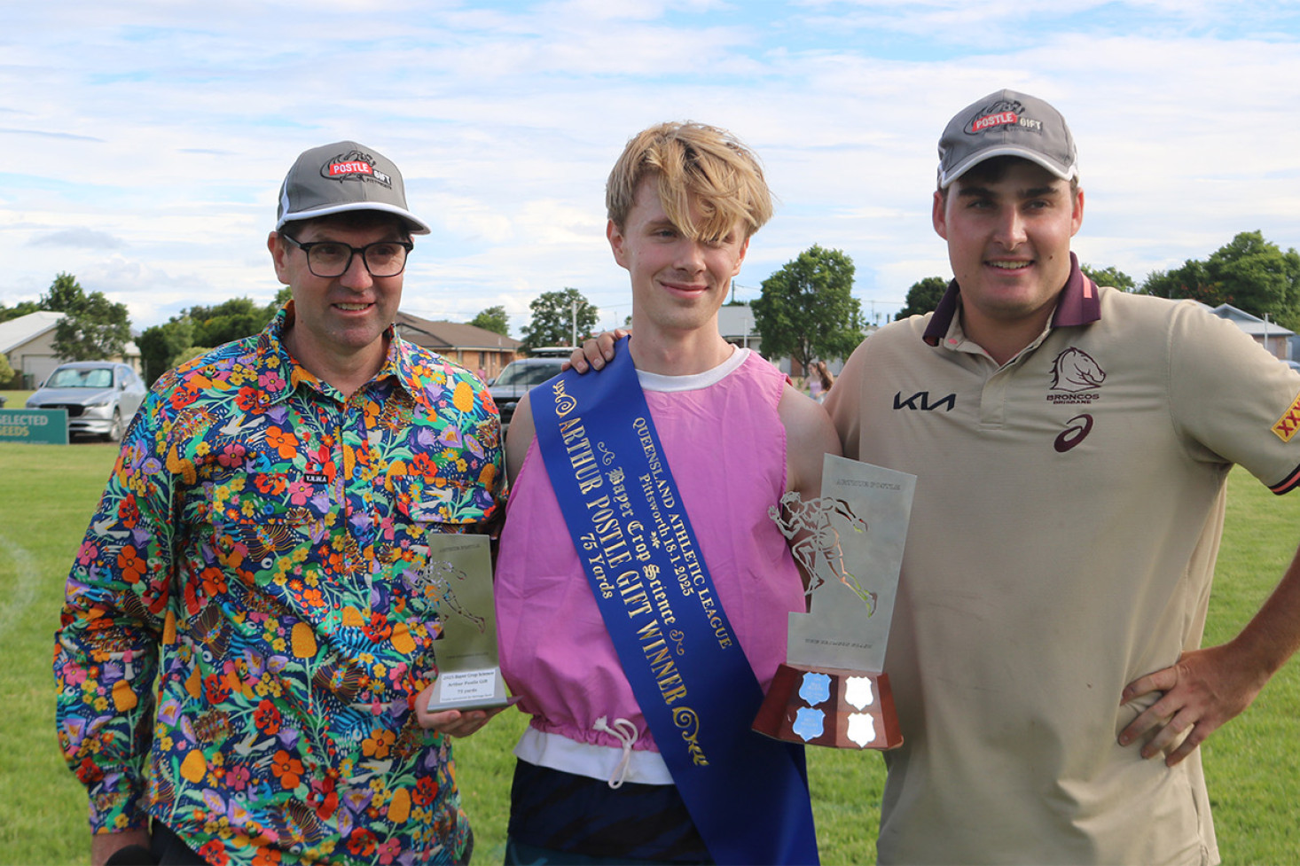 Hamish Macintosh (centre) was the winner of the Bayer Crop Science - Arthur Postle Gift 75 Yards on Saturday, pictured with Toowoomba Region Mayor Geoff McDonald and Max Mason, a relative of The Crimson Flash and former Arthur Postle Gift 75 Yards winner in 2018 and 2019.