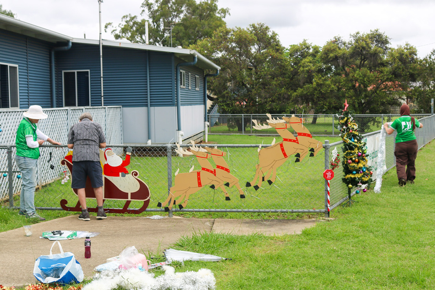 Members of Oakey Neighbourhood Watch decorate the Oakey Police Station in the Christmas Spirit.